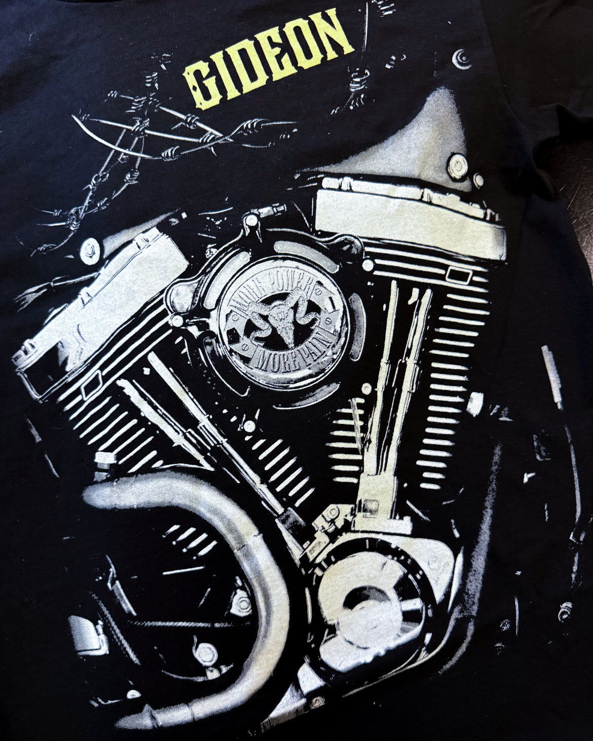 CLOSE UP OF ASPHALT COWBOY TSHIRT