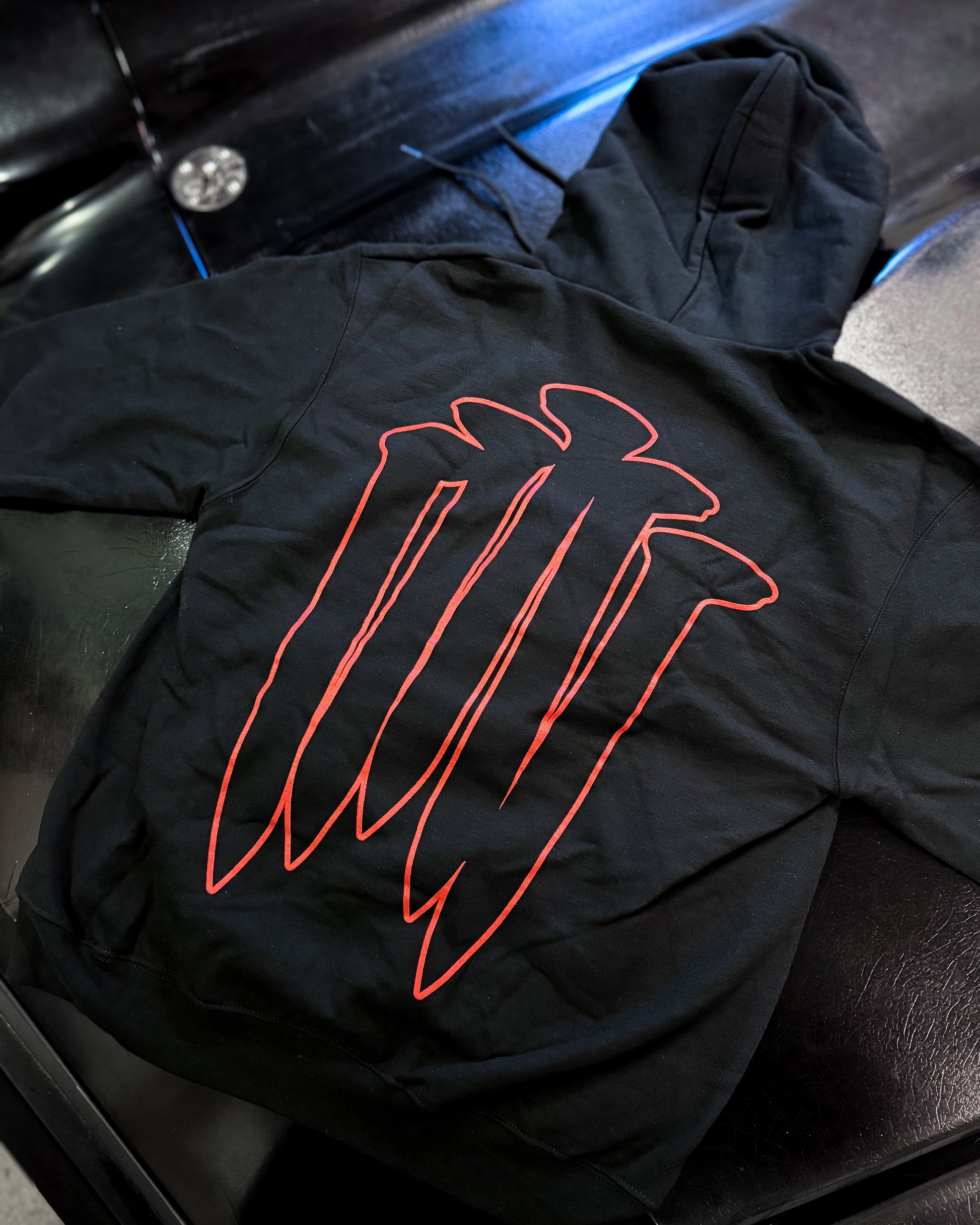 BLACK CHAMPION BRANDED HOODIE WITH WHITE GIDEON LOGO AND RED NAILS