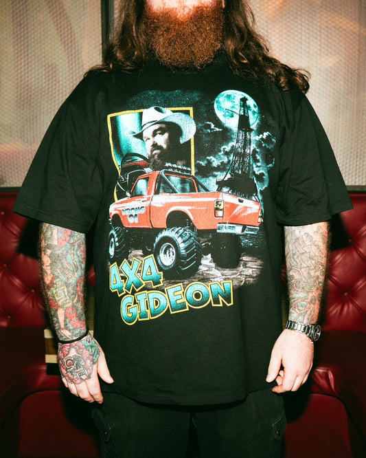 TYLER RILLEY wearing a black t-shirt with a graphic design of a truck and text,4X4 GIDEON